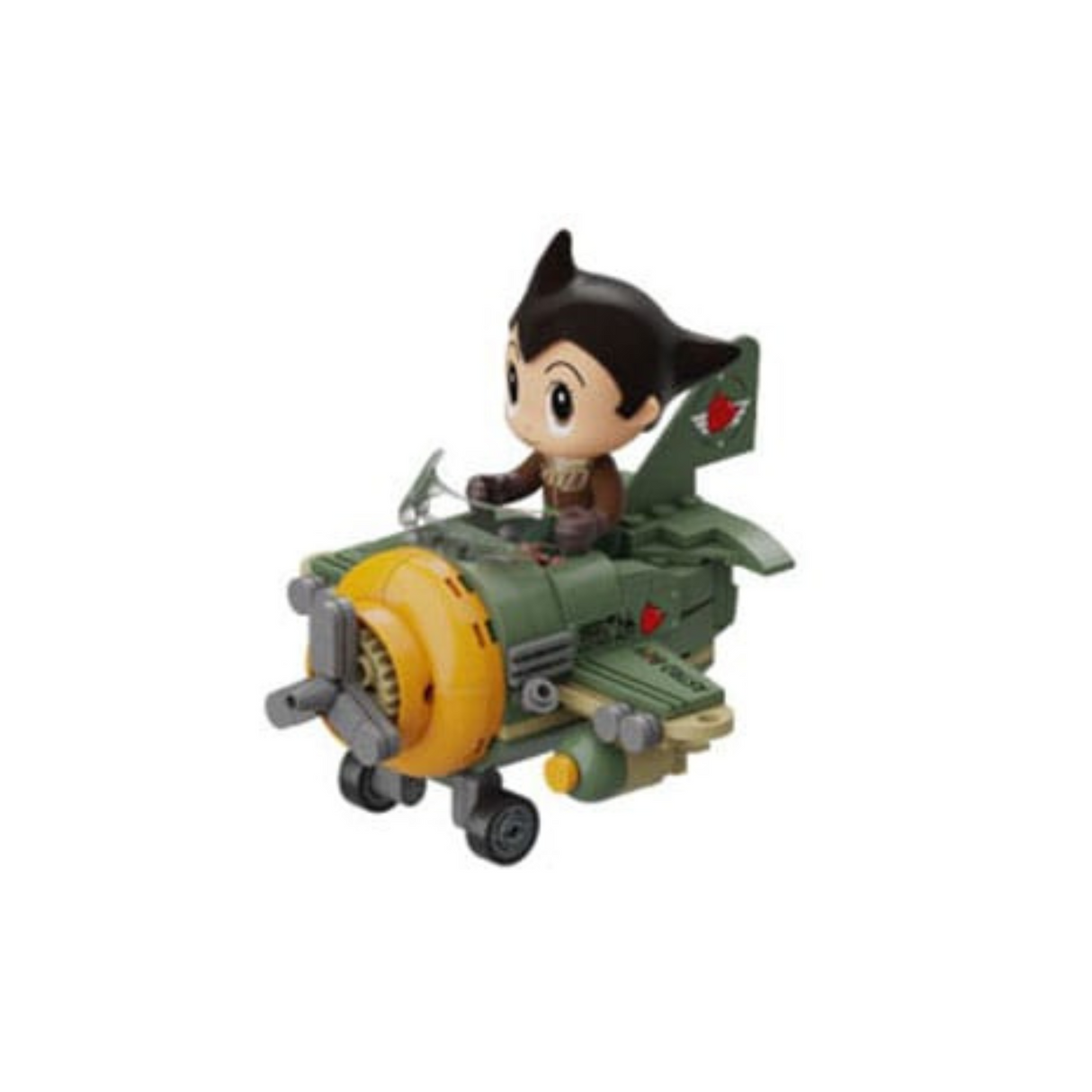 Kit de construction représentant Astro Boy dans un avion vert au style rétro. L’avion comporte une grosse hélice jaune, des ailes détaillées et une mini-figurine chibi d’Astro Boy aux commandes.