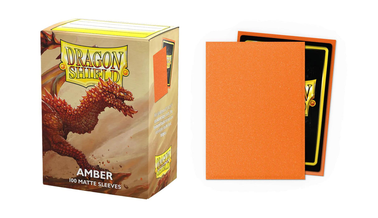 Boîte Dragon Shield Matte Sparkle Amber contenant 100 protège-cartes standard orange ambré scintillants avec finition mate.