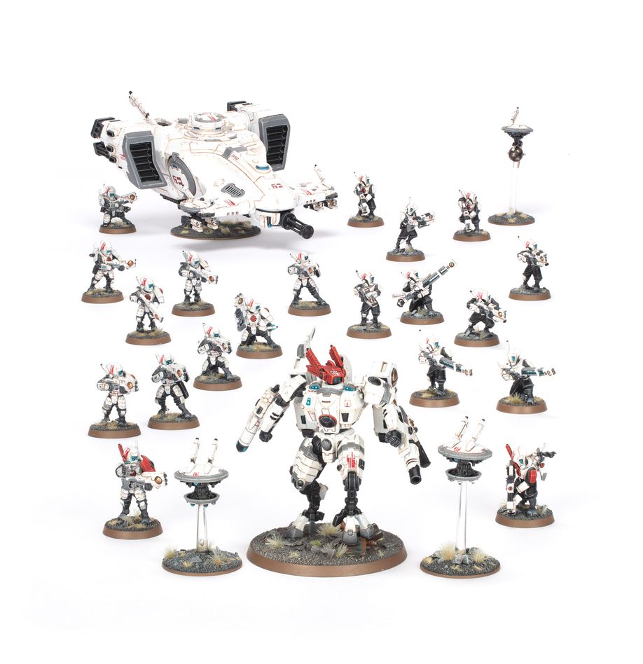 Boîte Warhammer 40,000 Combat Patrol T’au Empire avec 25 figurines futuristes incluant guerriers de feu, drones, battlesuit et transport Devilfish