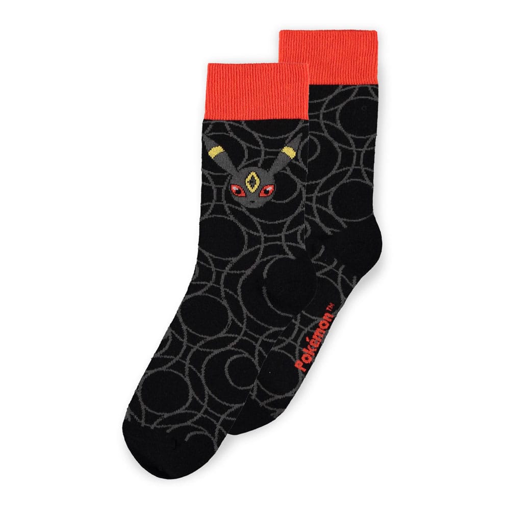 Pack de trois chaussettes Pokémon représentant Évoli, Mentali en rose et Noctali en noir avec embouts colorés assortis.