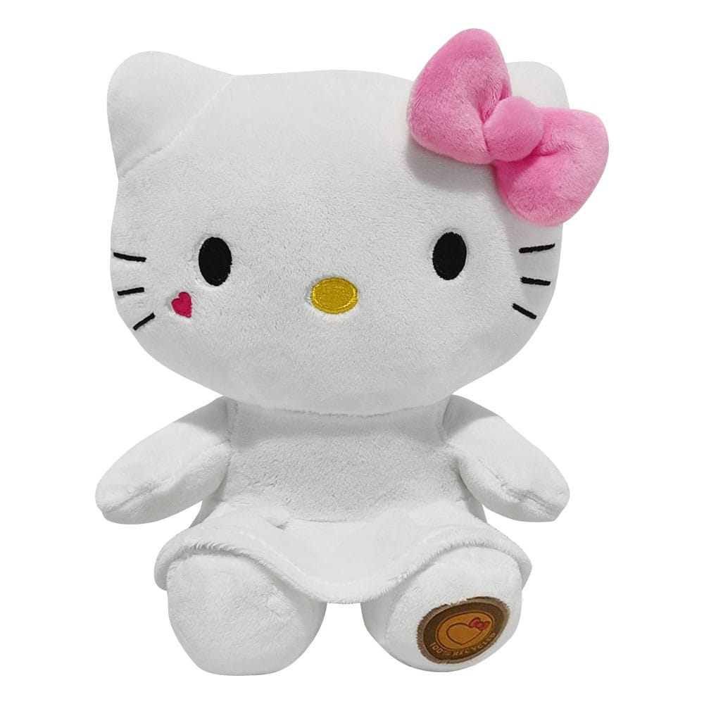 Peluche Hello Kitty de 24 cm en robe blanche avec nœud rose et cœur brodé, version officielle Sanrio.