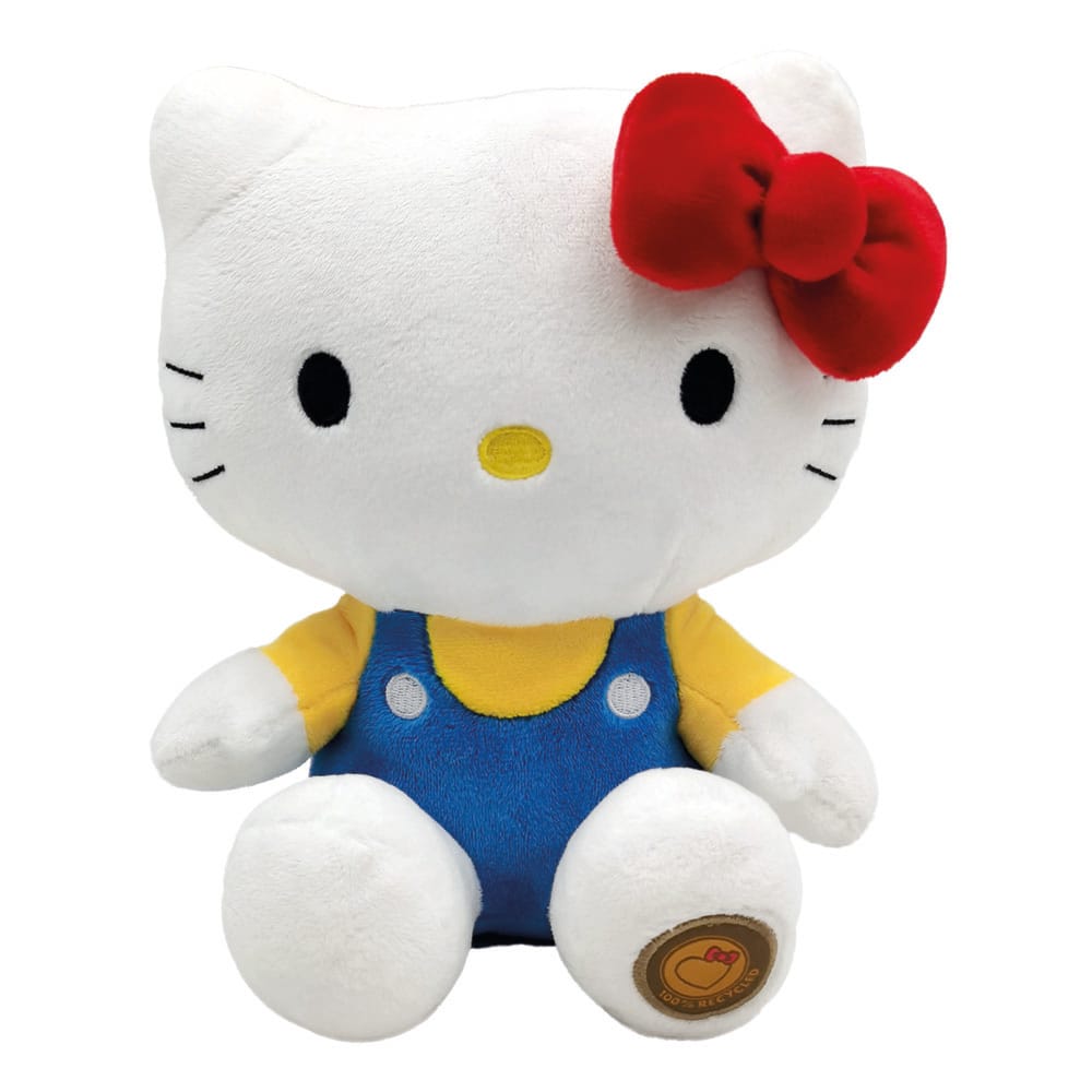 Peluche Hello Kitty Classic 24 cm avec salopette bleue et nœud rouge, design officiel Sanrio.