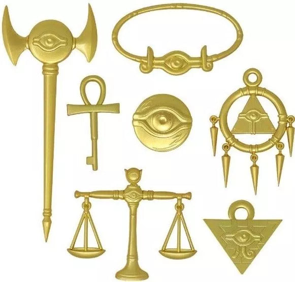 Coffret premium Yu-Gi-Oh! répliques officielles des 7 Objets du Millénium en métal doré