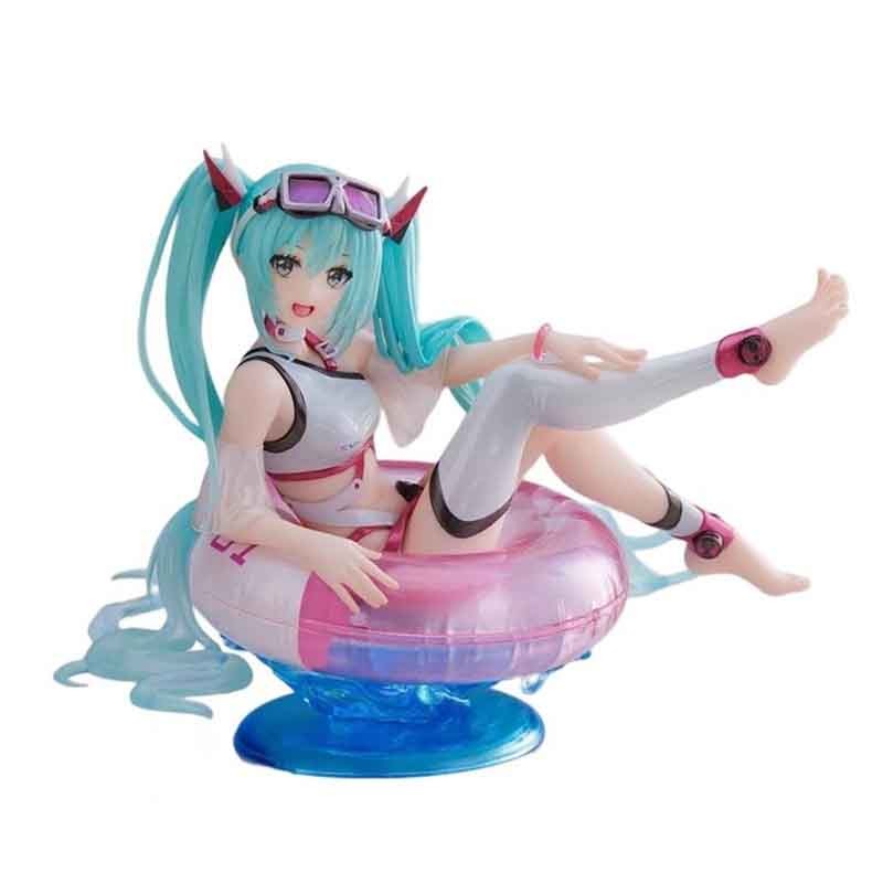 Figurine Miku Hatsune Aqua Float Girls – Miku en maillot de bain sur une bouée rose, cheveux turquoise et socle bleu en forme de vague.