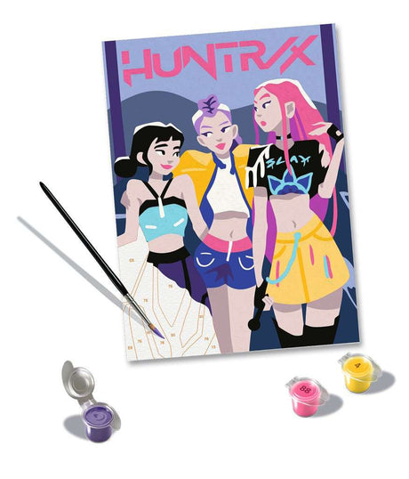 CreArt Ravensburger KPop Demon Hunters HUNTR/X, peinture par numéros 18 x 24 cm avec les trois héroïnes du groupe sur fond violet.