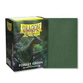 Boîte de 100 protège-cartes Dragon Shield Forest Green Matte au format standard, avec illustration d'un dragon vert sur le packaging et aperçu d'une sleeve vert forêt à finition mate.