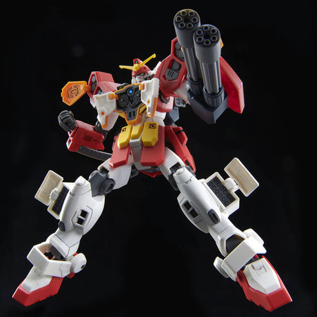 Gunpla HG 1/144 Gundam Heavyarms Custom Endless Waltz équipé de double gatling, en pose dynamique.