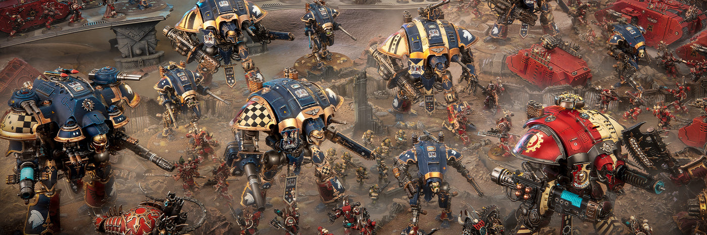Image de figurines Warhammer 40K en pleine bataille, avec Imperial Knights, Space Marines et véhicules blindés.