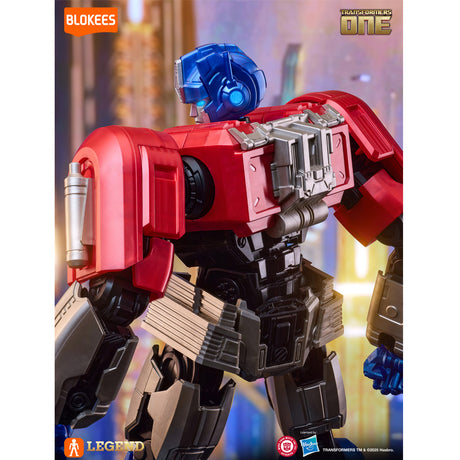Boîte Transformers Blokees Action Edition One Optimus Prime / Orion Pax avec visuel du robot rouge et bleu et mention LED.