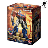 Boîte Transformers Blokees Action Edition One Optimus Prime / Orion Pax avec visuel du robot rouge et bleu et mention LED.