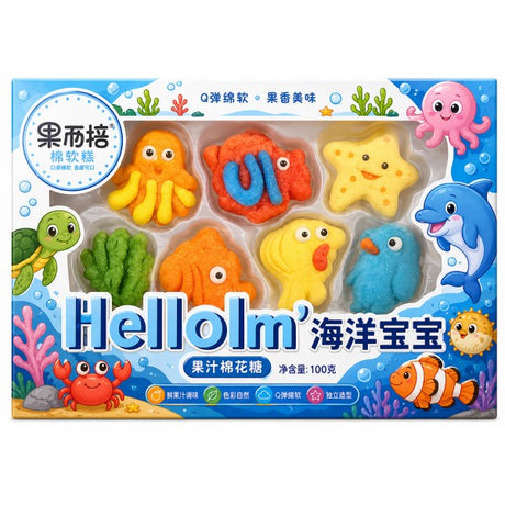 Boîte de Marshmallow Hello Sea Animals 100 g avec bonbons colorés en forme d’animaux marins, dont poulpe, poisson, étoile et dauphin.