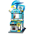 Set de construction Pokémon Keeppley Squirtle Swimming Tools Shop, boutique aquatique en briques bleues et blanches avec enseigne Carapuce, bouée, accessoires de plage et détails translucides.